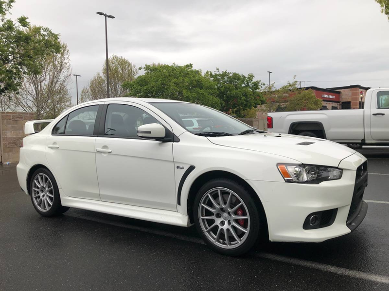 Illustration for article titled At $25,000, Could This 2015 Mitsubishi Lancer Make You Believe in EVO-lution?